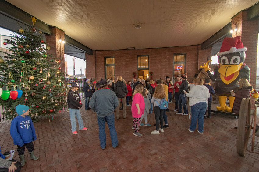 Attendees begin to gather out front of the Lewis County Historical Museum for the City of Chehalis' Christmas Tree lighting ceremony on Saturday, Dec. 2.