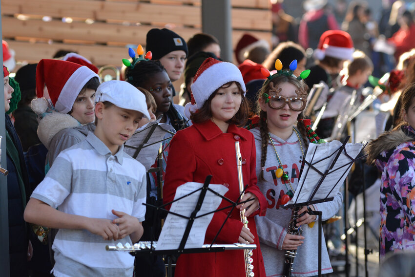 Band members at Christmas in the Park prepare for their performance on Dec. 2 at Yelm City Park.