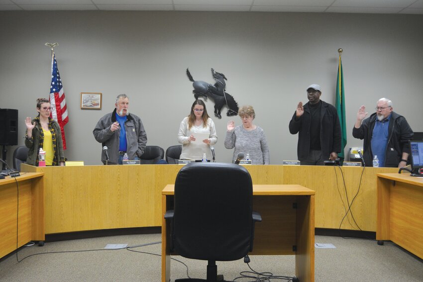 Roy City Council members are sworn in on Dec. 11 following their re-election.