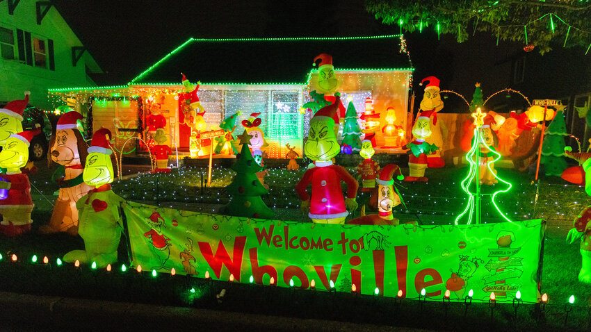 Lights illuminate Whoville located in the 900 block of North Pearl Street in Centralia as inflatable decorations glow on Tuesday, Dec. 12.