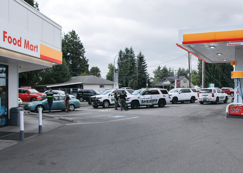 The Clark County Sheriff&rsquo;s Office works on clearing a call at the Shell gas station at Northeast 117th Avenue across from Prairie High School in September.