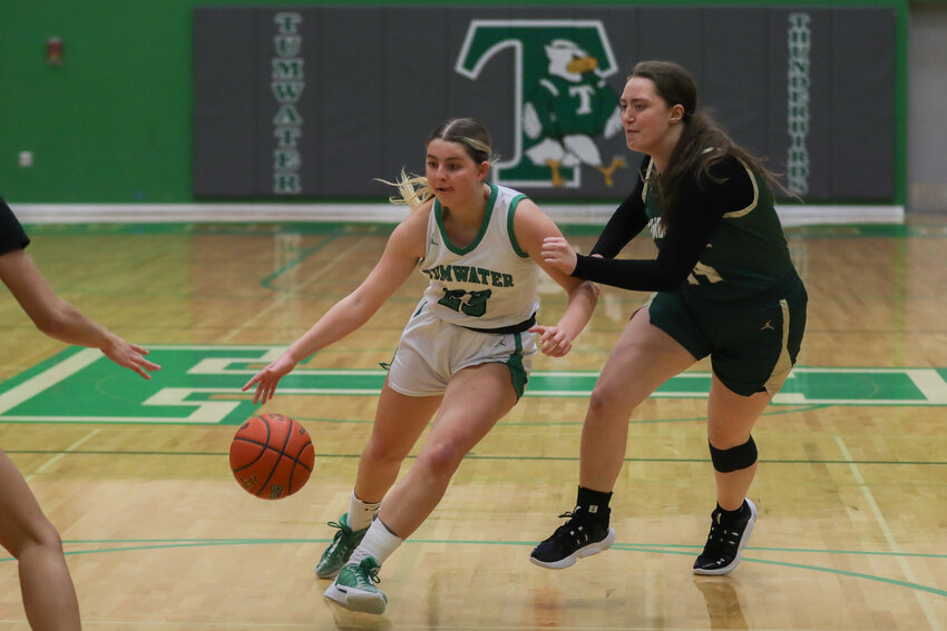 Sydney Sumrok drives into the lane during Tumwater's 60-33 loss to Timberline on Dec. 18,.