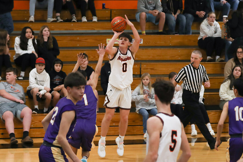 Cayle Kelly puts up a 3-pointer during the first half of Napavine's 78-47 win over Mabton on Dec. 23.