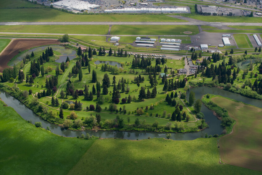 The Chehalis River winds alongside Riverside Golf Course and the Chehalis-Centralia Airport in this Chronicle file photo.