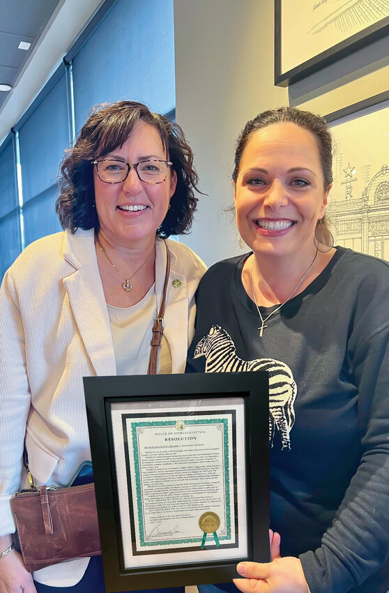 State Rep. Stephanie McClintock, 18th District, recognizes Brush Prairie resident Sandra Sermone with a House resolution in her honor.