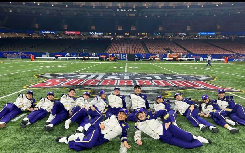 Centralia High School Class of 2022 graduate Lucy Nowicki poses with fellow members of the UW Marching Band at the Sugar Bowl in New Orleans, Louisiana, in early January, 2024. Courtesy photo.