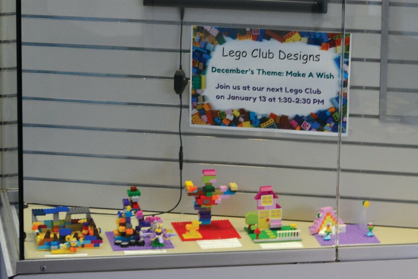 Five LEGO builds are displayed at the entry level of Yelm's Timberland Library.