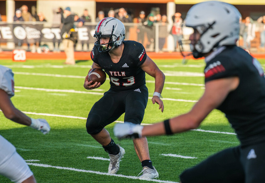 Yelm running back Brayden Platt looks toward the Eastside Catholic during the 3A State Championship game Saturday in Puyallup&rsquo;s Sparks Stadium.