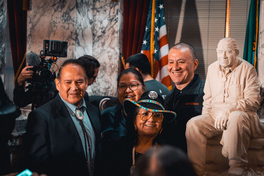 From left to right: Representative Chris Stearns (D-Auburn 47th), Nisqually Vice Chair Antonette Squally, Puyallup Tribal member and treaty rights activist Nancy Shippentower, and Nisqually Chairman Willie Frank III stand next to the maquette of Billy Frank Jr.