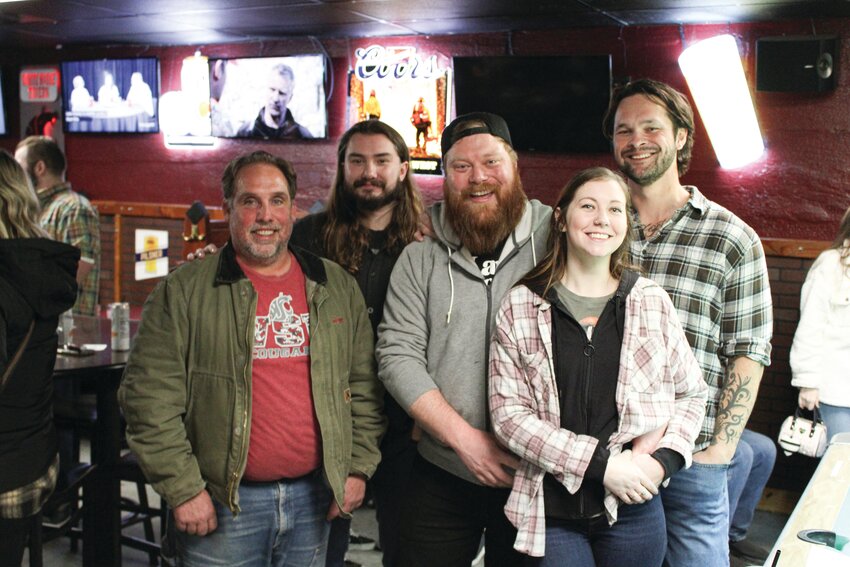 Kyle Phillips, Zack Rosenquest, Wesley Fogle, Jocelyn Fogle and Veejay Lach pose for a photo at White Horse Tavern on Jan. 19.