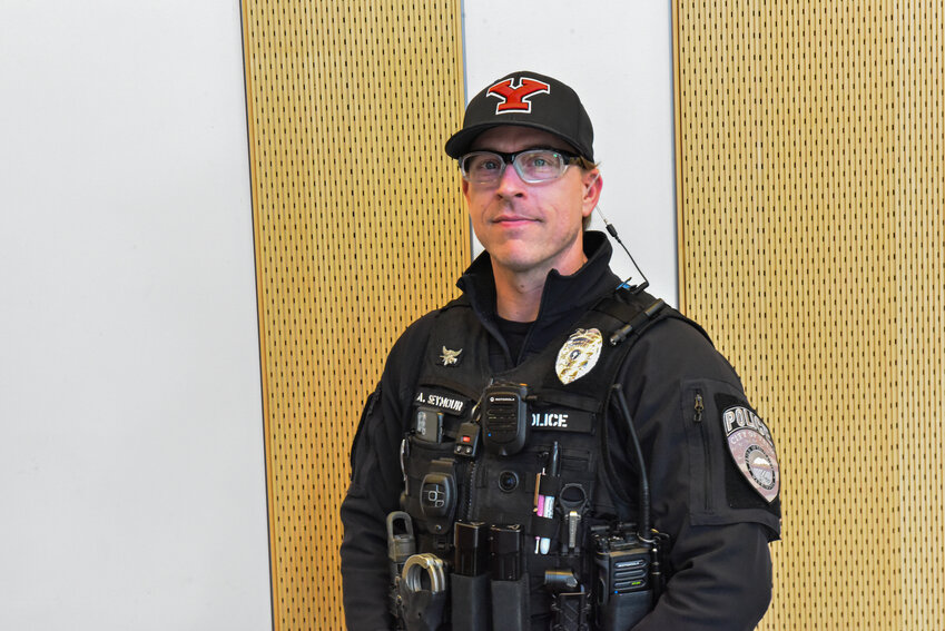 Yelm Police Department's officer of the year, Chris Seymour, poses for a photo on Monday, Jan. 22.