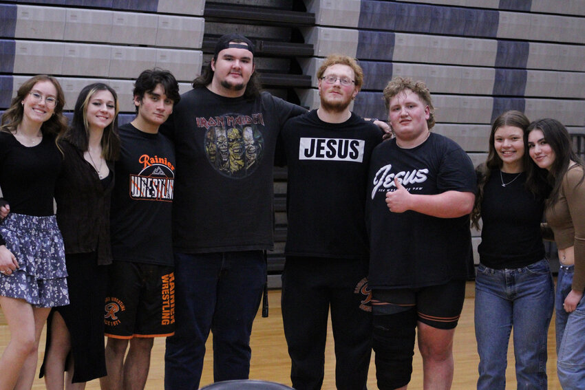 Seniors on the Rainier wrestling team pose for a picture after a 42-30 win over Rochester on Jan. 18.