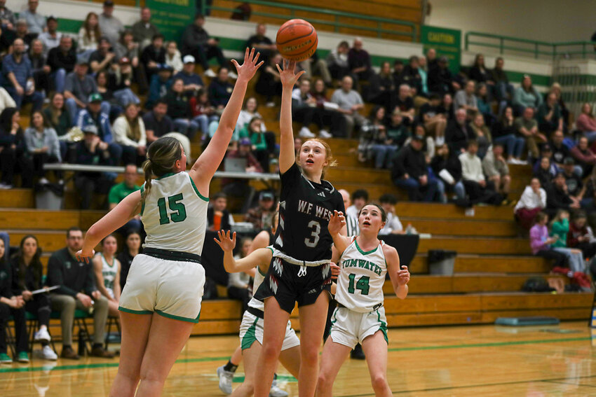 Dilyn Boeck puts up a floater during W.F. West's win over Tumwater on Jan. 25.