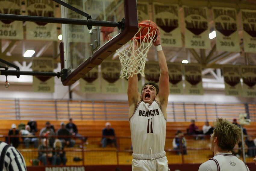 Grady Westlund puts home a two-handed dunk during W.F. West's win over Rochester on Jan. 29.