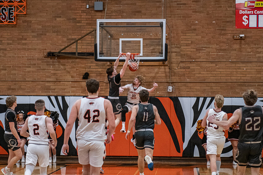 Parker Eiswald throws down a two handed slam during a swamp cup basketball match up between W.F. West and Centralia on Jan. 30.