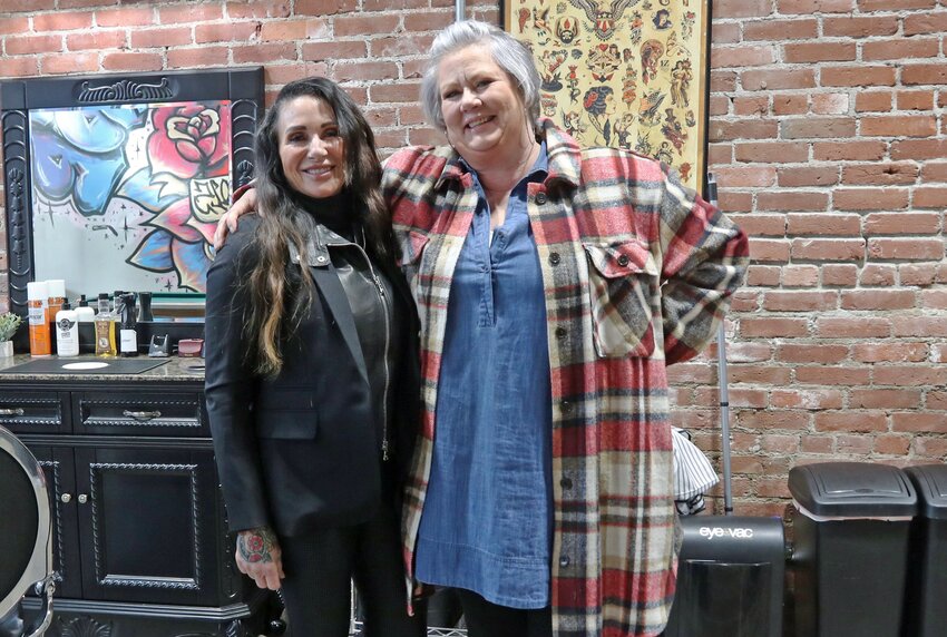 The Refined Man Owner Shawna Charboneau, left, and Sheri Karl, who is the manager of The Refined Man&rsquo;s Centralia shop, pose for a photo at The Refined Man&rsquo;s Centralia shop on Thursday, Jan. 11..