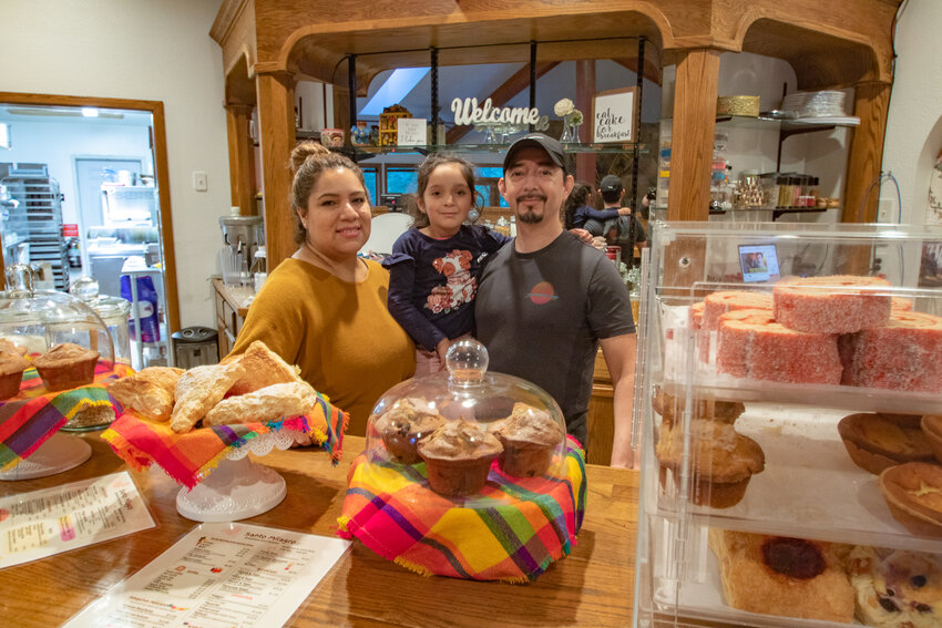 Lorena and Aminadad &quot;Mina&quot; Rojas pose with their daughter, Zoe, inside of their new business, Santo Milagro Breakfast and Sweets in Packwood on Thursday, Feb. 1.