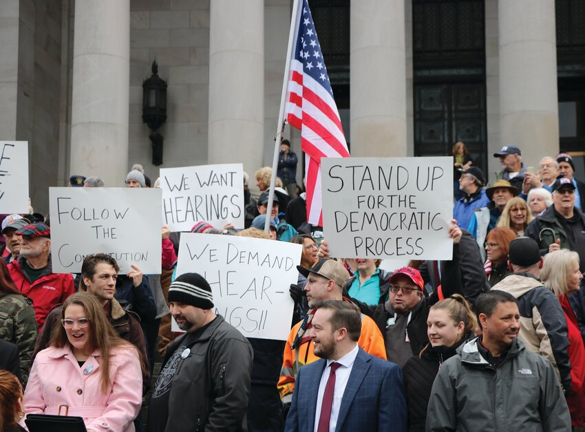 Washingtonians from all over the state gathered on the north steps at the capitol in Olympia, for a rally planned only a week in advance. Protesters displayed signs that read &ldquo;We want hearings,&rdquo; and &ldquo;Follow the constitution.&rdquo;