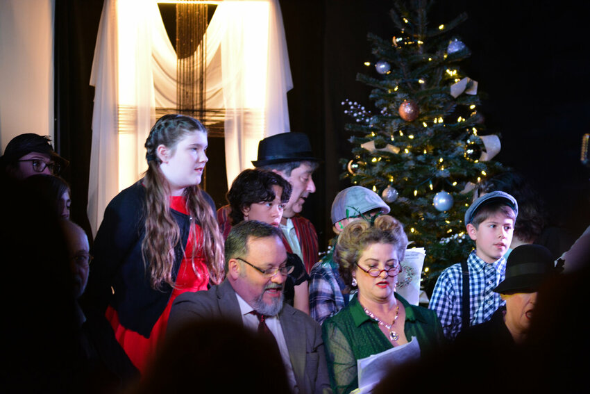 Members of the Standing Room Only Theater perform a Christmas song on Dec. 9 at Yelm&rsquo;s Outpost Church during the group&rsquo;s &ldquo;It&rsquo;s a Wonderful Life&rdquo; performance.