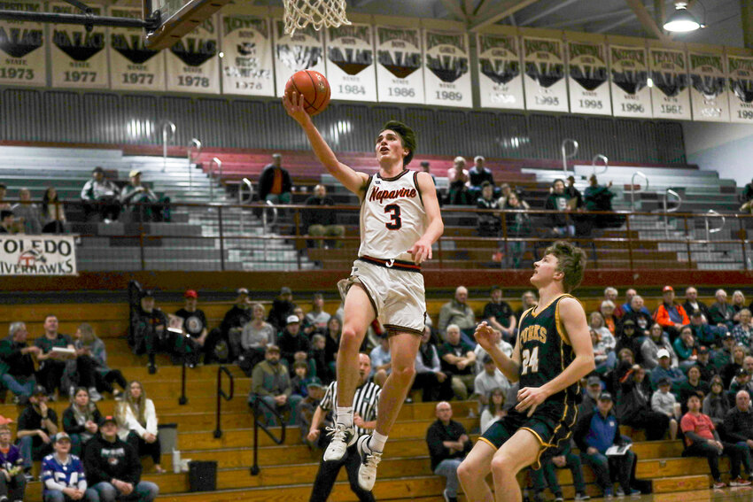 James Grose has a free path to the bucket during Napavine's 74-38 win over Forks in the 2B District 4 quarterfinals at W.F. West on Feb. 7.