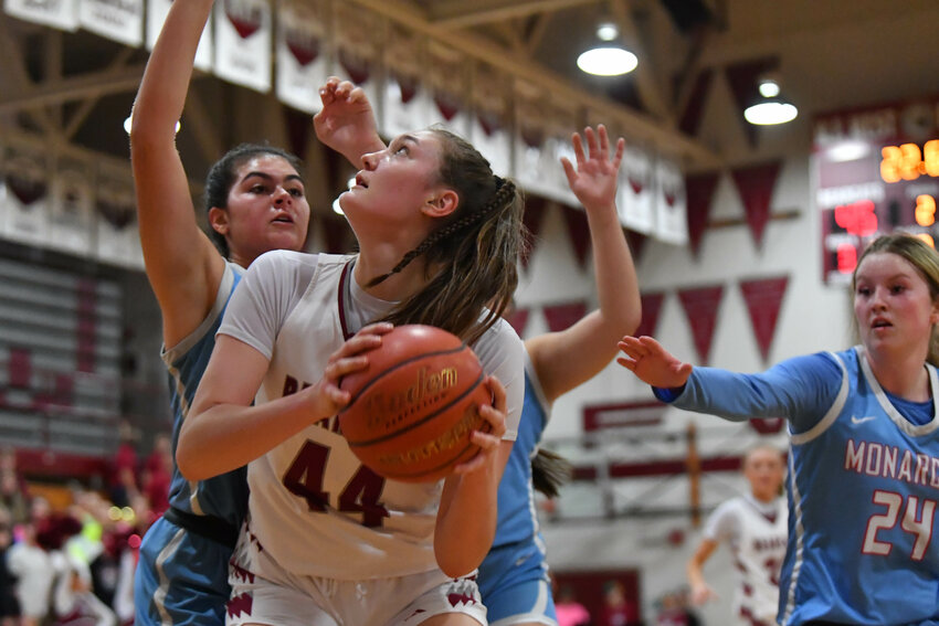 Julia Dalan eyes the basket while being guarded in the paint during W.F. West's 76-29 win over Mark Morris in the 2A District 4 quarterfinals on Feb. 9.
