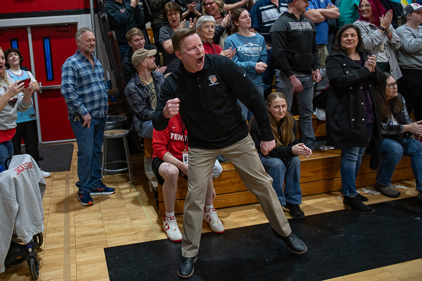 Tenino head coach Ryan Robertson celebrates during a 63-52 win over Elma in Feburary. Robertson is the co-race director of the Chehalis Activators Classic that is taking place this weekend.