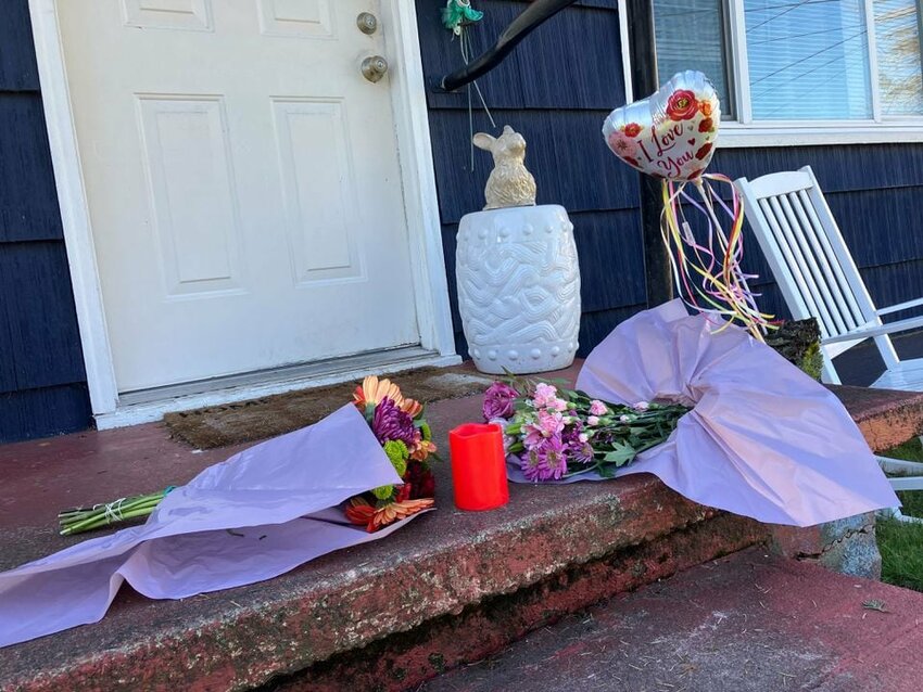 Flowers were left on the doorstep of the home Janette Becraft and Billy Jack Haynes shared in the Lents neighborhood on Saturday, Feb. 10, 2024.