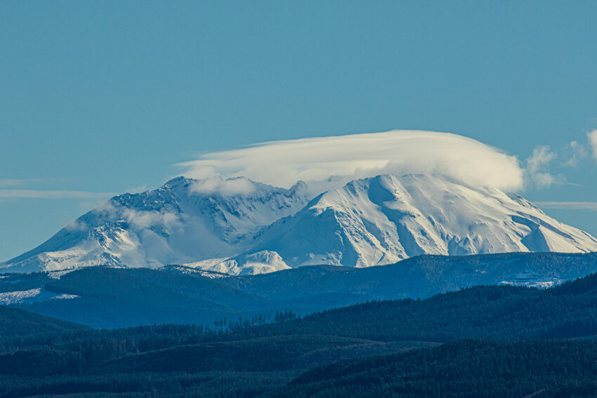 Lenticular clouds cast a shadow over Mount St. Helens' crater as seen from Schoen Road near Silver Creek on Saturday, Feb. 10.