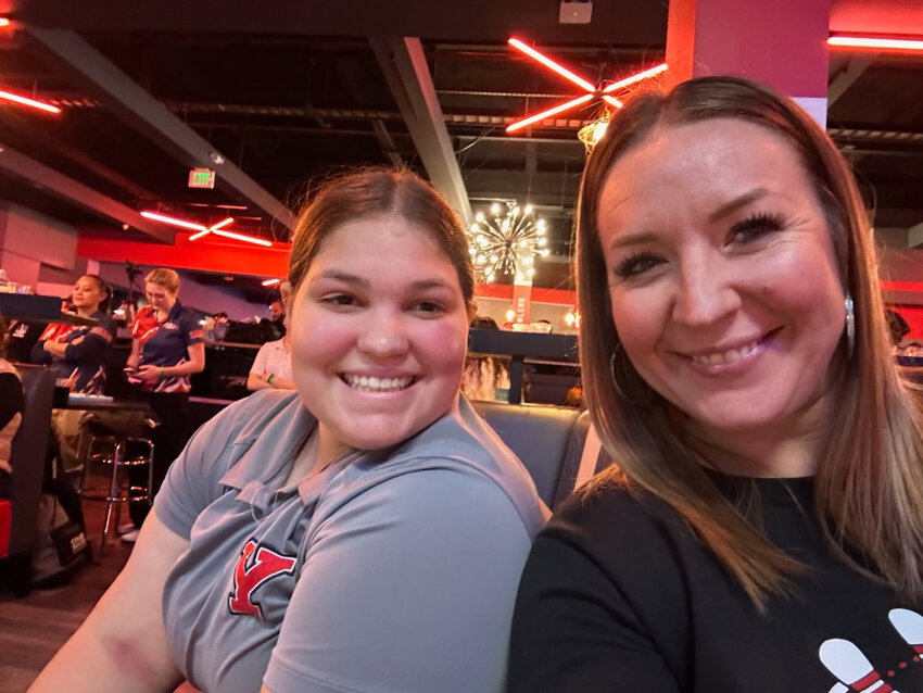 Miranda Hunt takes a selfie with YHS bowling coach Averie Ford at the state championships in Tukwila.