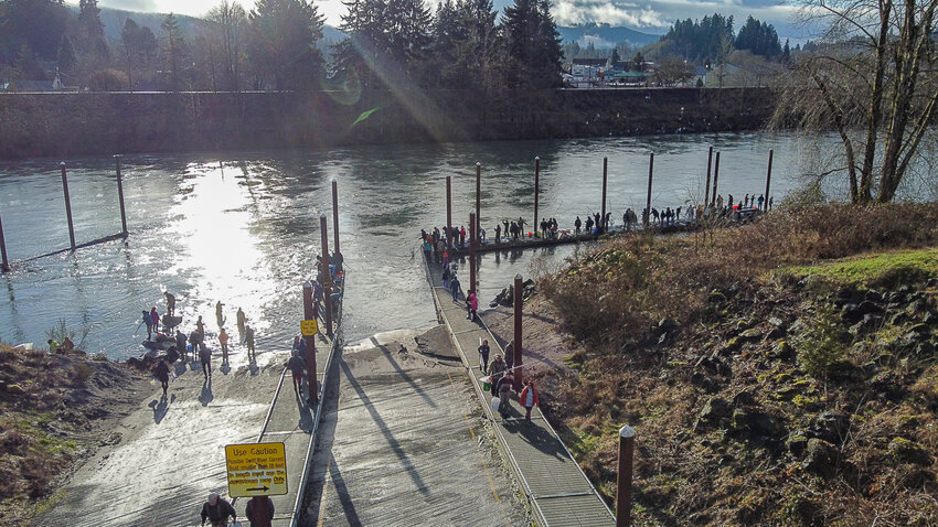 Anglers from across Western Washington are pictured from above as they partake in a five-hour limited smelt-dipping opener on a designated portion of the Cowlitz River on Feb. 15 in Castle Rock.