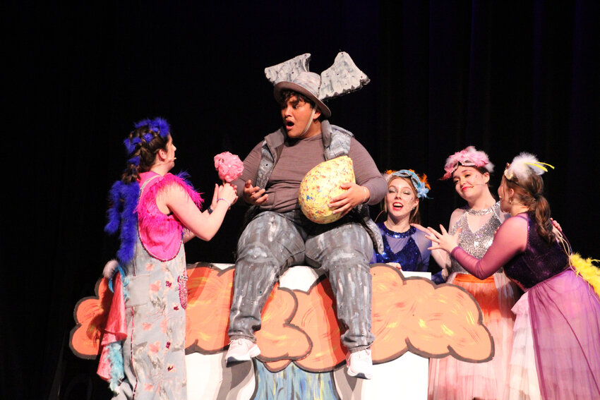 Mackenzie Cornwall (left), playing Gertude McFuzz, and Adrian Roberto (center), playing Horton the Elephant, rehearse a scene from 