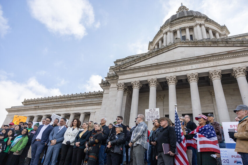 People gather at the Capitol during the &ldquo;Let&rsquo;s Go Washington&rdquo; initiatives rally in Olympia on Friday, Feb. 23, 2024.