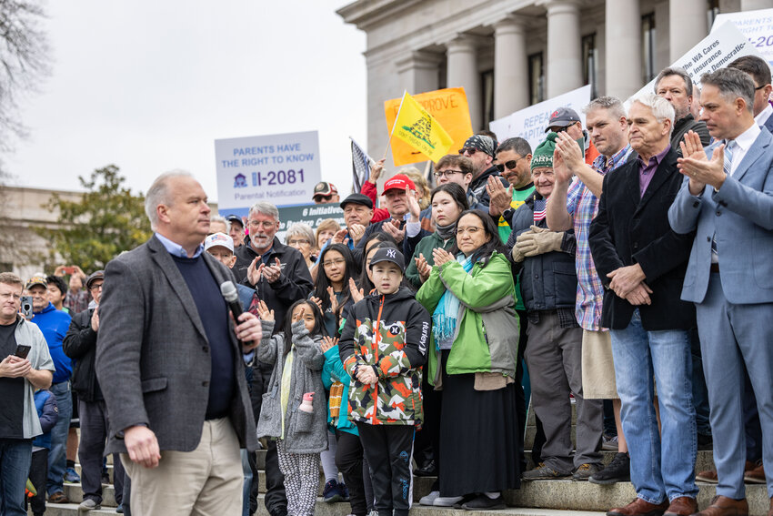 Rep. Jim Walsh speaks during the &ldquo;Let&rsquo;s Go Washington&rdquo; initiatives rally at the Capitol in Olympia on Friday, Feb. 23, 2024.