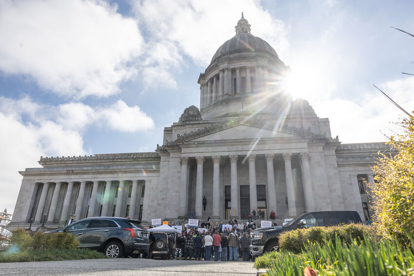 People gather at the Capitol during the &ldquo;Let&rsquo;s Go Washington&rdquo; initiatives rally in Olympia on Friday, Feb. 23, 2024.