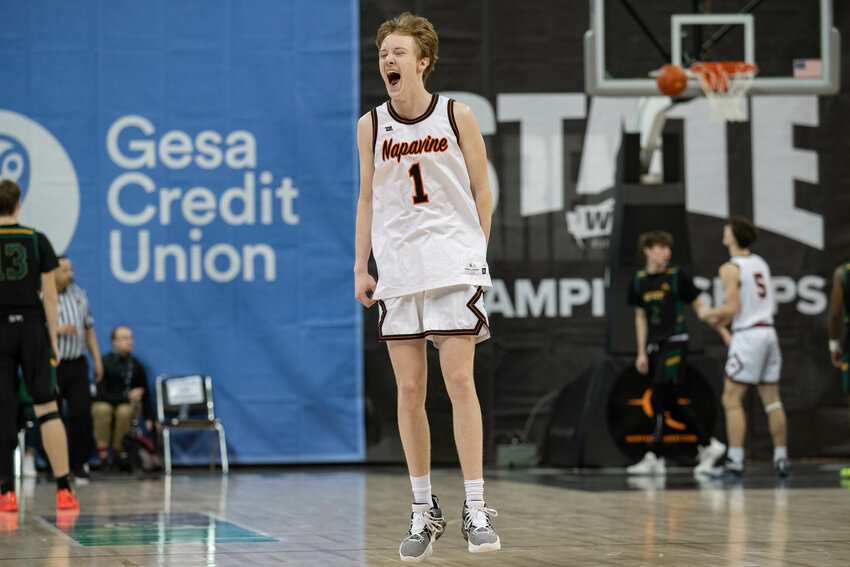 Jarin Prather celebrates as the final buzzer sounds of Napavine&rsquo;s 2B quarterfinal win over NW Christian on Feb. 29 at the Spokane Arena.