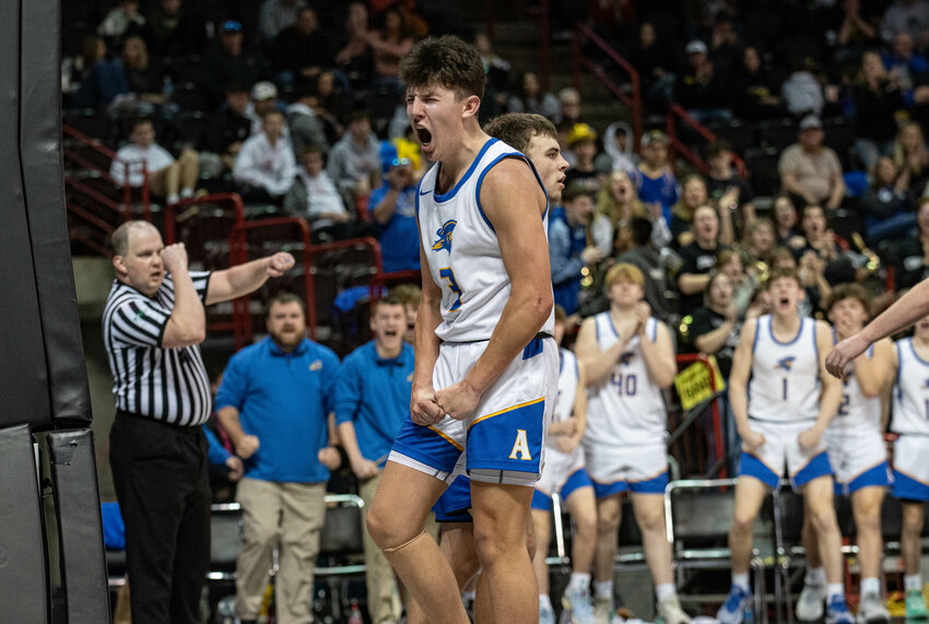 Braeden Salme yells after dropping an and-one during Adna&rsquo;s 2B elimination game win over Toutle Lake on March 1 at the Spokane Arena.