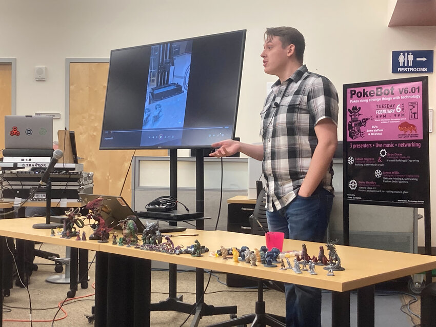 James Willis presents his Dungeons and Dragons figurines at the PokeBot V6.01 event at the University of Wyoming on Feb. 6.
