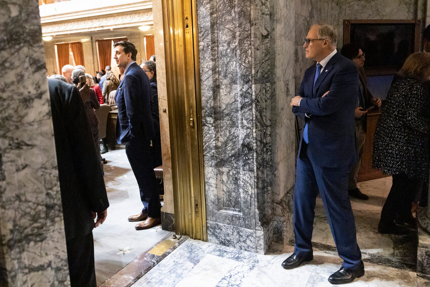 Gov. Jay Inslee watches the House on the last day of the 2024 Legislature at the state Capitol on Thursday, March 7.