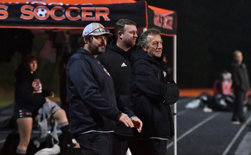 Kalama girls soccer coach John Bates (right) watches the Chinooks play against Napavine in the 2023 regular season finale.