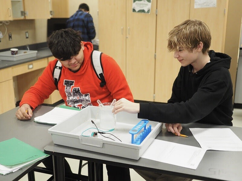 Two students in the REVIT training program at Centralia High School are pictured in this photo from the Department of Ecology.