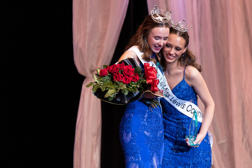 Katelynn Guenther, Miss Lewis County, and Capri O&rsquo;Neill, Miss Lewis County&rsquo;s Teen, hug after winning the 2024 titles at Corbet Theatre on Saturday, March 9.