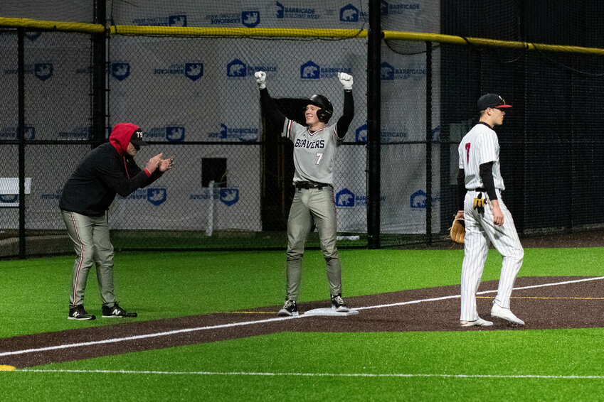 Austin Gonia celebrates a bases-clearing triple during a game between Tenino and Toledo at Centralia College on March 11.