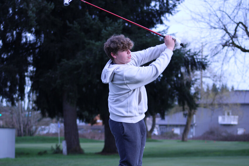 Thomas Sprouffske watches his drive during practice at Tahoma Valley Golf Course on March 8.