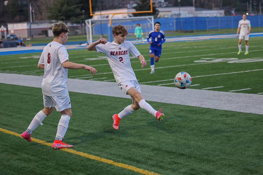 Gage Grisham boots the ball upfield during W.F. West's win over Kelso on March 13.