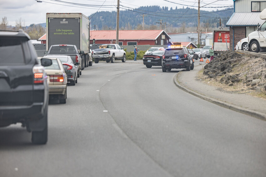 FILE PHOTO &mdash; Traffic backs up after a collision at 1570 N. National Ave. in Chehalis at the intersection of Coal Creek Road on Wednesday, March 2, 2023