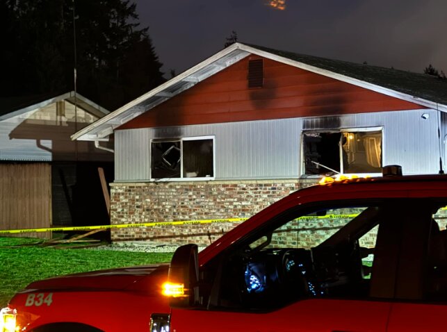 Investigators suspect arson may have caused a house fire in the Tanglewilde area near Lacey early Thursday morning.