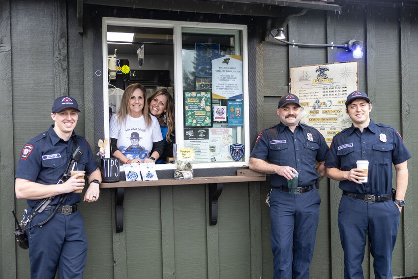 From left, Brandon Schaffer, the brother of Justin Schaffer, Angie Krause, Leicey Prihar, Daniel Holmes and Max Loewenstein pose for a photo at Skull and Crossbones Coffee Co. in Adna on Friday, March 22. On Friday, the coffee stand donated $1 for each drink, the Trooper and Pirate drinks, to the Adna High School Justin Schaffer Memorial Scholarship Fund.