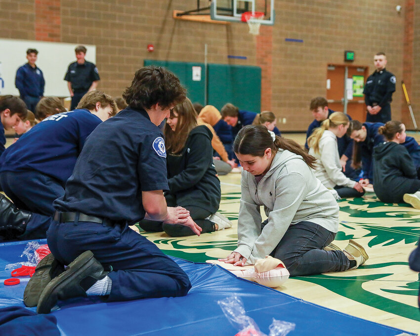 Students at Battle Ground&rsquo;s Tukes Valley Middle School learn how to provide CPR on Monday, March 18, while being taught by Clark County Fire District 3 cadets.