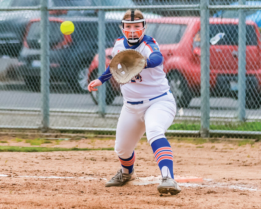 Ridgefield&rsquo;s Faith Smith prepares to catch an out at first base during the Spudders&rsquo; 2-1 win over the Mark Morris Monarchs on Wednesday, March 20.