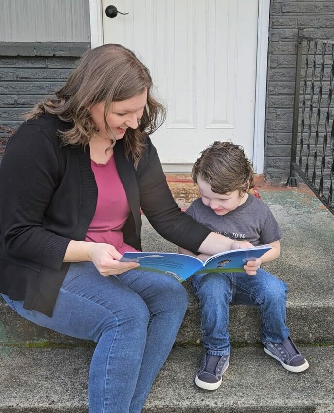 Napavine mother Cassandra Whitaker reads &ldquo;The Happy Flappy Child&rdquo; with the inspiration for the book, her son Wyatt, in this photo she provided to The Chronicle.